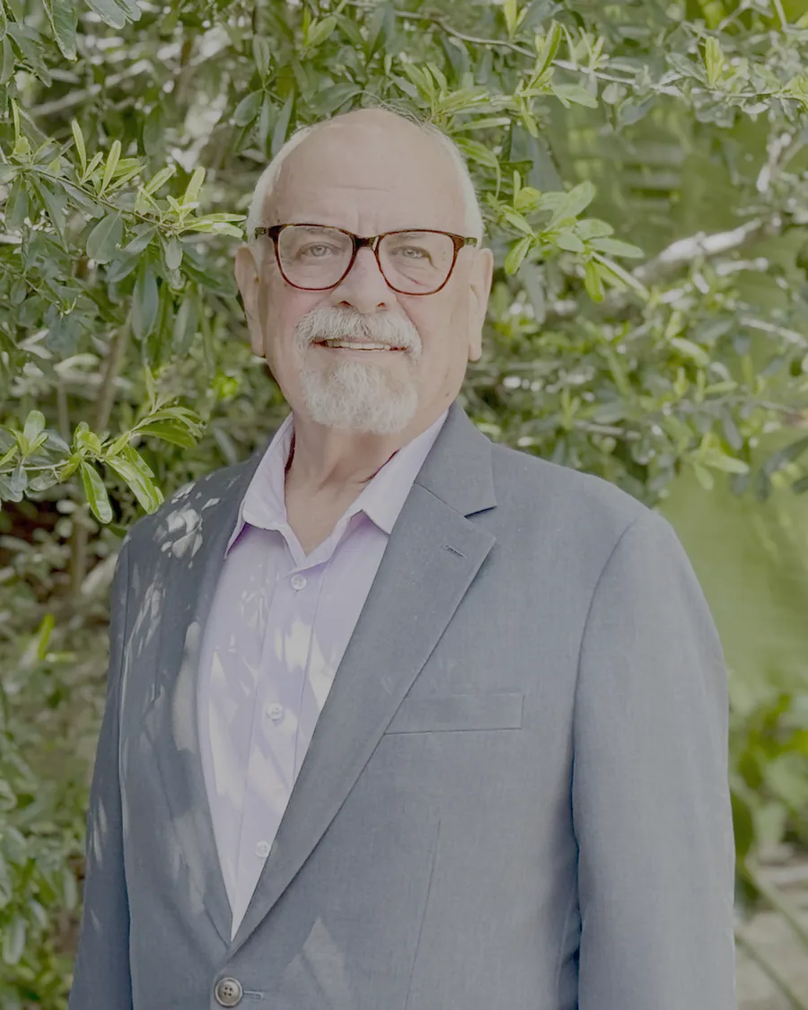 Portrait of Ron Franklin in a garden